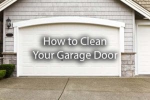A gorgeous white garage door with the words, how to clean your garage door.