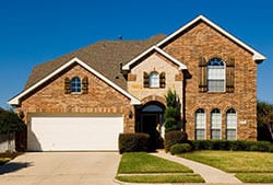 Action Garage Doors installed a door on a beautiful two-story residential home and repair, service, and maintenance in Friendswood Texas