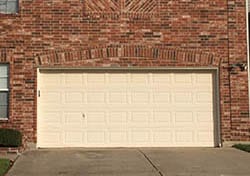 Action Garage Doors installed and repaired this wonderful steel two car garage door on a beautiful home in Grand Prairie Texas