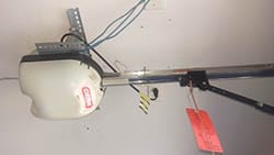 Action Garage Door was called to a Denton Texas home to repair or replace this broken garage door opener and installed a new one