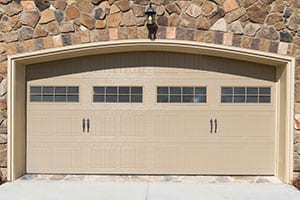 Residential house garage door made from steel that Action Garage Doors installs, repairs, services, and maintains for their customers in the Colleyville Texas area a suburb of the Dallas Fort Worth metro area
