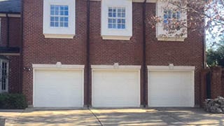 The professional single car steel garage doors installed and repaired in Highland Park Texas by Action Garage Doors technicians of Plano Tx