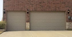 Action Garage Doors is the contractor responsible for this professional install and repair of this custom three car garage doors in Frisco Texas