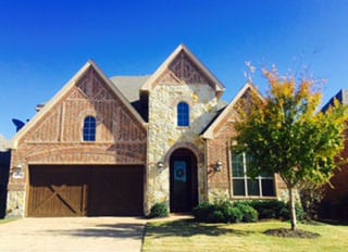 Action Garage Doors is the premier install and repair professionals for custom wood two car garage doors in homes in Trophy Club Texas