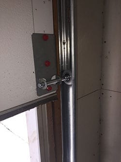 As garage doors age vital components begin to wear and fail. Here is a new garage door roller installed by technician 1 Dallas Tx Action Garage Doors