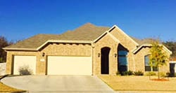This beautiful home in Lake Worth Texas was serviced by Action Garage Doors for install and repair of steel garage doors
