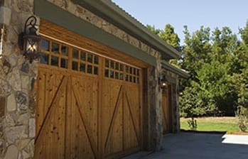Lewisville Texas residential wood garage door installation and repair by Action Garage Doors Dallas Fort Worth professionals