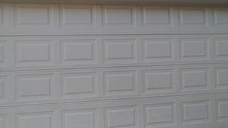 Brand new installed and repaired steel garage door at the residential home 1324 Parkview Ln Murphy Texas by Action Garage Doors