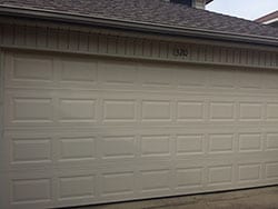After Action Garage Door did their initial inspection at this home in Lewisville Texas they replaced the old broken down garage door with a new one