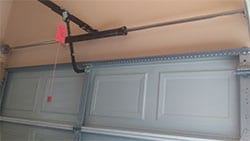 Action Garage Doors highly qualified technicians installed a garage door opener and torsion bar spring in McKinney Texas