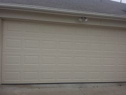 Action Garage Doors top technicians were called to this residential home to install a new steel garage door in Arlington Texas
