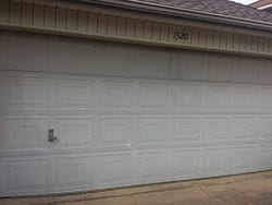 Action Garage Doors was assigned the repair and or replace of this faded broken residential garage door in Lewisville Texas and Adan Vega the technician