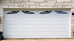 Residential and commercial steel garage doors installed by Action Garage Doors of Leander Texas. They also repair install wood garage doors in the local area