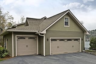 Residential double and single car garage doors repaired and installed by Action Garage Doors of Saginaw Texas a suburb of Dallas and Fort Worth