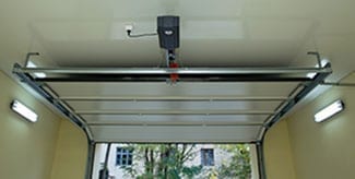 Residential and commercial automatic garage door opener installed by Action Garage Doors of Coppell Texas. Additionally they service, repair, and maintain garage doors in the Dallas Fort Worth area