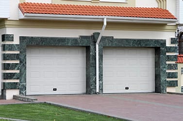 Residential steel and wood garage doors repair, install, service, and maintenance by background checked professionally trained technicians in Irving Texas Action Garage Doors