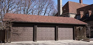 Residential three car garage doors are serviced, installed, repaired, and maintained by Action Garage Doors highly qualified technicians of Crowley Texas