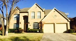 At this residential home in Grapevine Texas technician Alfredo Dinnerville installed and repaired two single car steel garage doors