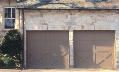 Custom residential wood garage doors installed, repaired, and serviced in University Park Texas by Action Garage Doors of Plano